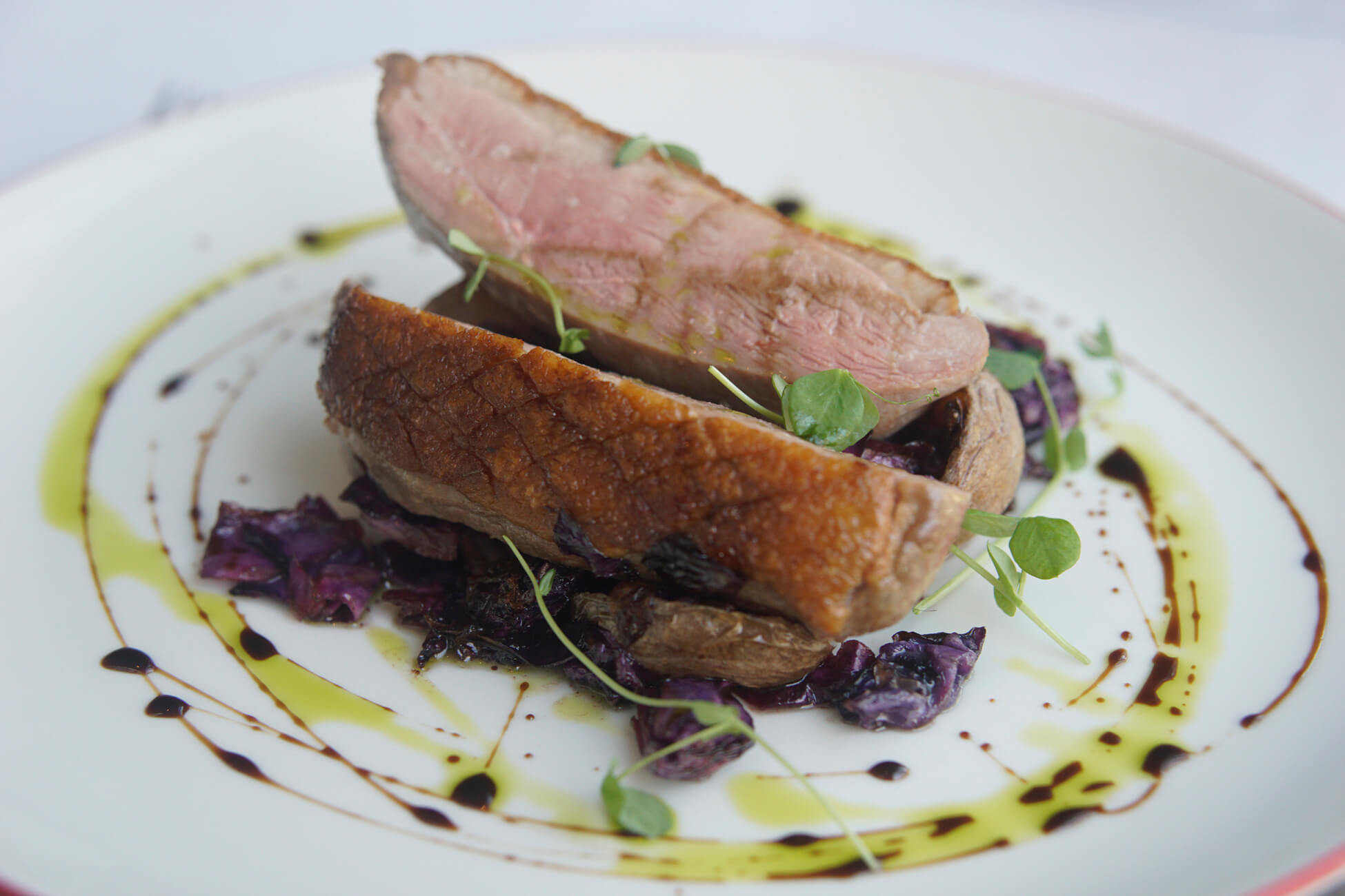 Duck Breast with Crispy Baby Yukon Potato and Red Cabbage Confit